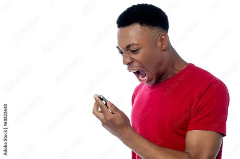 Angry Young Man Yelling Stock Photo Adobe Stock