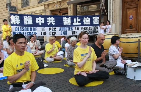 Falun Gong Practitioners In France Assemble In Front Of The Chinese