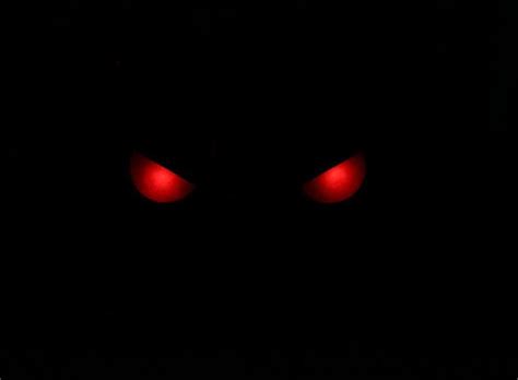 You Walk Outside At Night And See A Pair Of Glowing Red Eyes Peering At