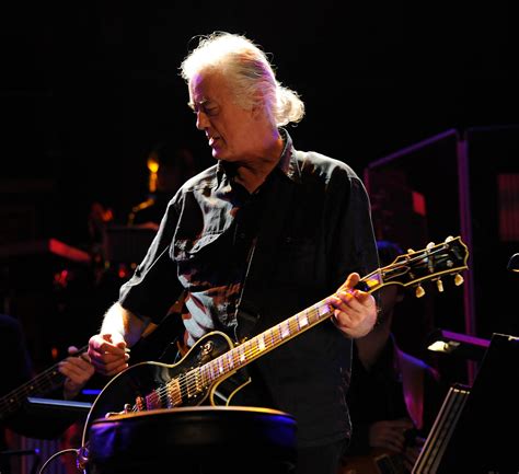 Led Zeppelins Jimmy Page Laughs Plays Air Guitar In Court Cbs News