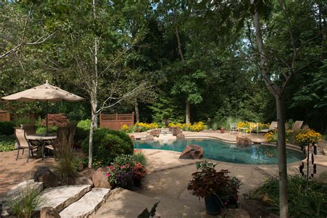 Nestled In Nature Tropical Pool Cedar Rapids By Pool Tech Houzz