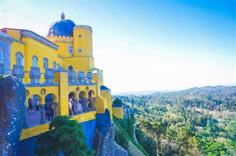 Pena Palace Overlooking The Valley Of Sintra With Green Forests A