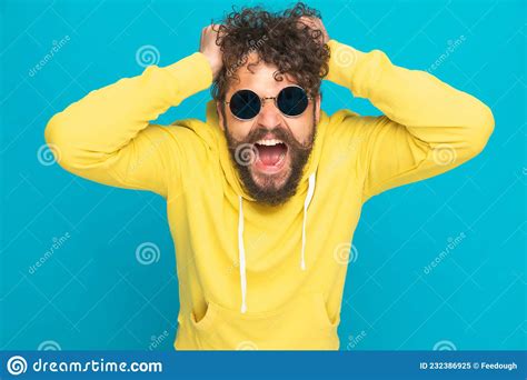 Angry Man Ripping Of His Shirt Royalty Free Stock Photography