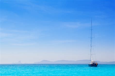 Premium Photo Ibiza Mountains With Sailboat From Formentera