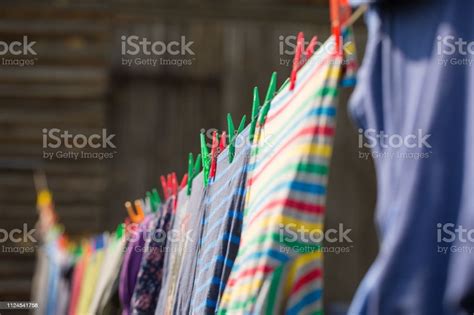 Clothes Hanging On Washing Line In Outdoor Stock Photo Download Image