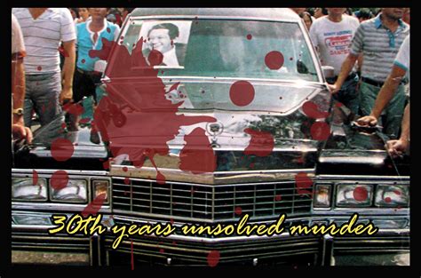 Note that the flag had been defiantly lowered by the crowd as the truck carrying the bier passed. Tribute to Ninoy