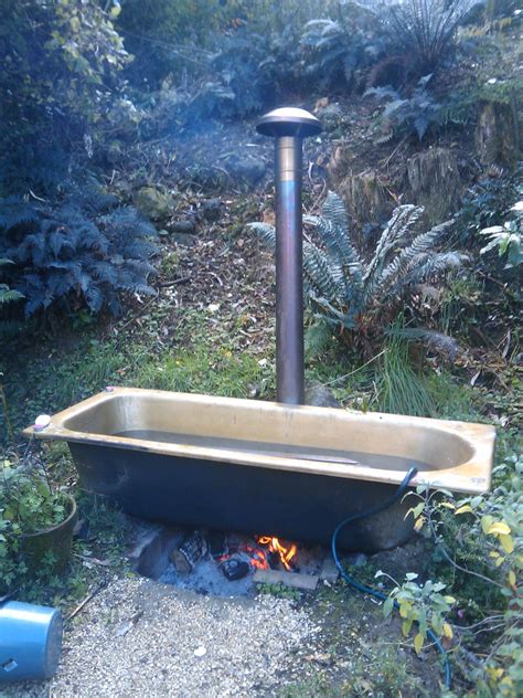 How Cool A Fire Underneath Heats The Water In The Bath A Wooden Platform In The Bath Keeps