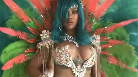 rihanna wears revealing beaded bikini turquoise wig and feathers at barbados crop over
