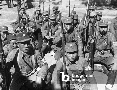 Chinese Red Army Soldiers Sitting With Rifles China