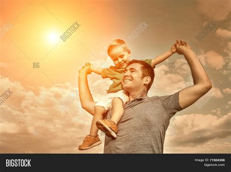 Son Seating On Father Image Photo Free Trial Bigstock