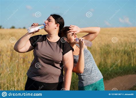Women Drink Water And Rest After Outdoor Jogging Stock Image Image Of