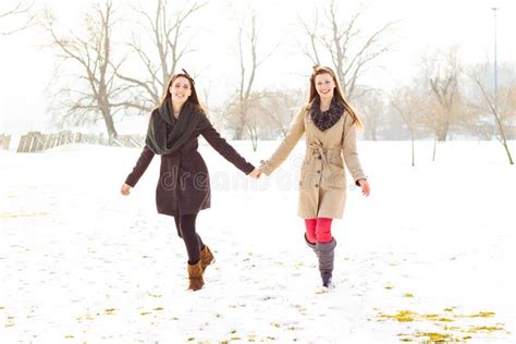 Two Best Friends Holding Hands And Walking Stock Image Image Of