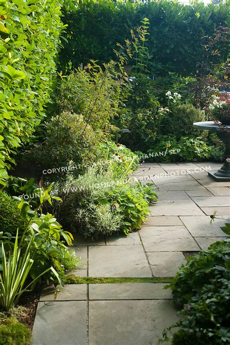 Most perennials are great to decorate a pathway or border with such as creeping mint or lemon thyme. df020179_garden-flagstone-patio-photo.jpg ...