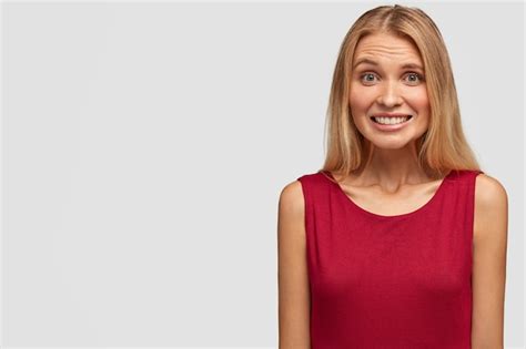 Free Photo Portrait Of Adorable Young Woman In Red T Shirt Giggles