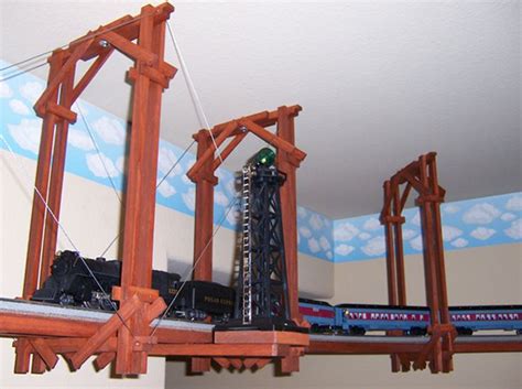 Since we do not have a room to dedicate for a permenant layout, we decided to do an train track. Ceiling Train kits | ceiling train | Pinterest
