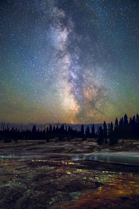 These Night Skies Over Yellowstone Are Hauntingly Beautiful