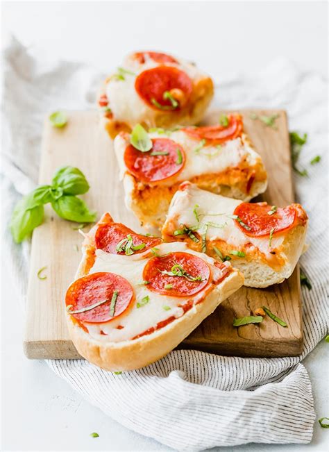 The best homemade french bread pizza that's crisp on the bottom and loaded with a variety of toppings. French Bread Pizza - Recipe Girl®