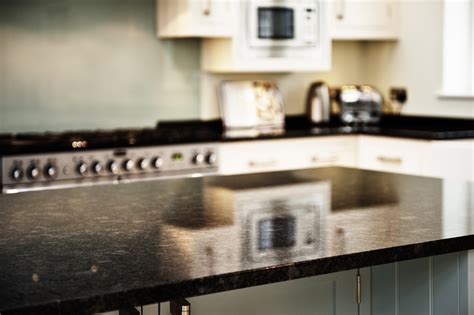 Discover oak worktops at howdens. steel-grey-granite-cuckfield-west-sussex-yew-tree-kitchens ...