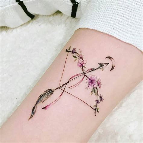 Floral Bow And Arrow Tattoo