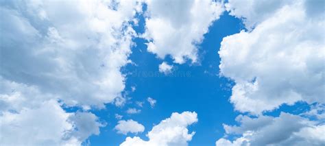 Blue Sky Cloudscape Background Banner Panorama With Clouds And Sun