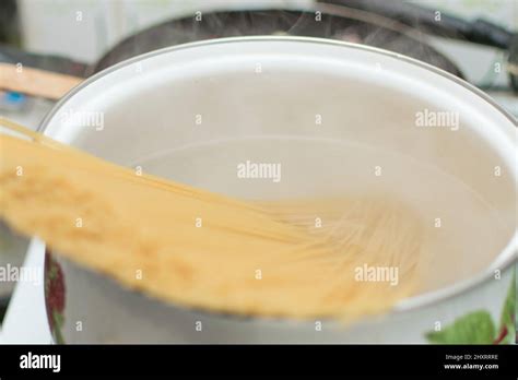 Spaghetti Boiling In A Saucepan Stock Photo Alamy