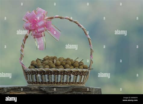 Fresh Longan Fruits In T Baskets On Wooden Stock Photo Alamy