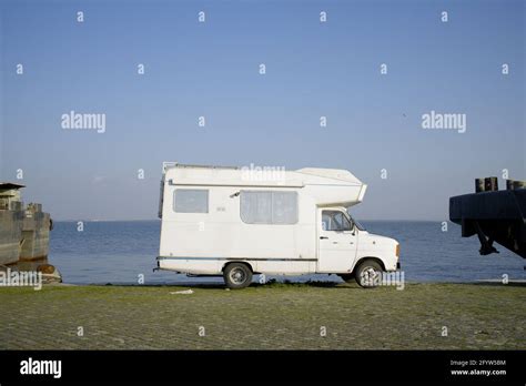 Vintage Camper Van Parked By The Riverfront Stock Photo Alamy