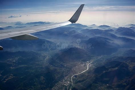 Aerial View Of Misty Mountains Lake And Clouds Above The Mountain