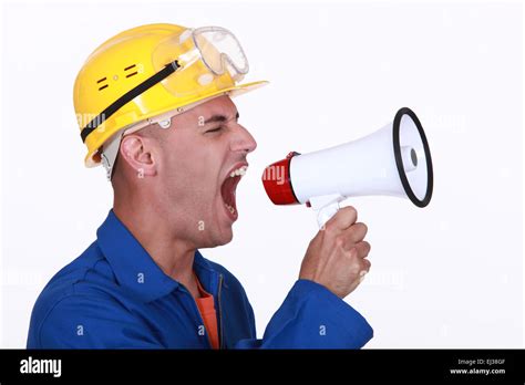 Construction Worker Shouting Into Megaphone Stock Photo Alamy