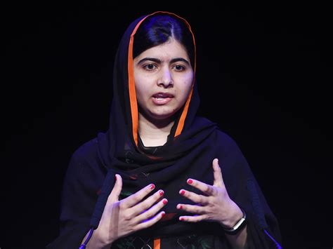 An image of malala yousafzai speaking passionately.