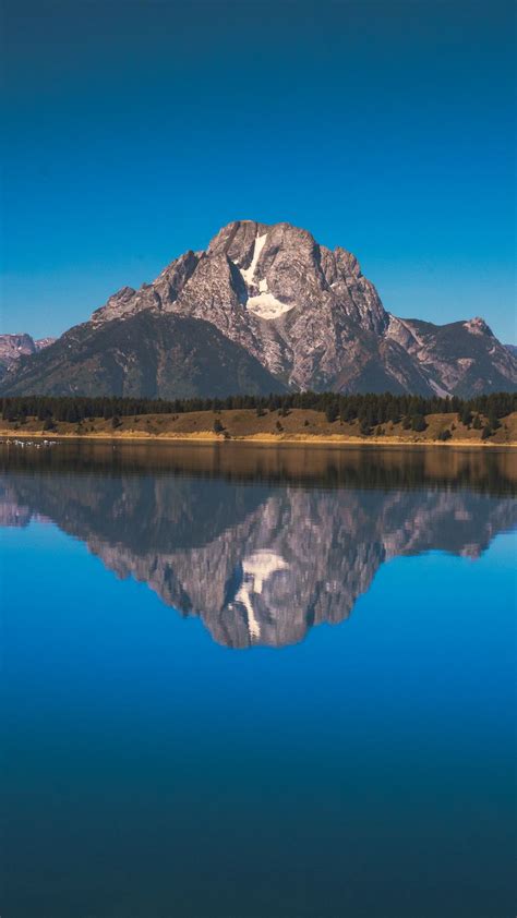 Download Wallpaper 938x1668 Lake Mountains Shore Water Reflection