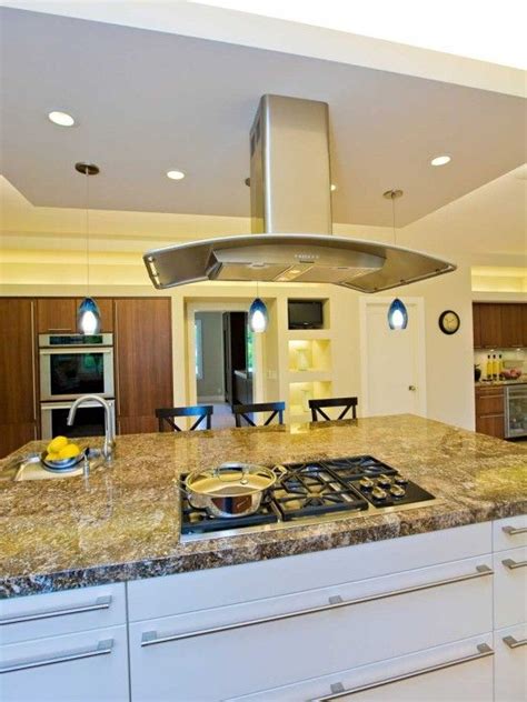 You must also choose an exhaust fan system that's large enough for your kitchen. Free Standing Range Hood Design, Pictures, Remodel, Decor ...