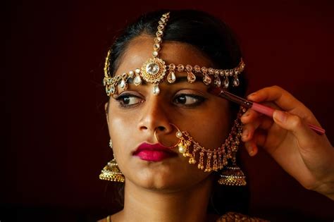 Premium Photo Indian Beautiful Female In Golden Rich Jewelery And