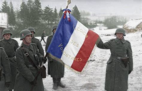 Follow me! the goal of this site is two fold. French Soldiers of the German Legion des Voluntaires Unit Holding a French Flag in Russia (1941 ...
