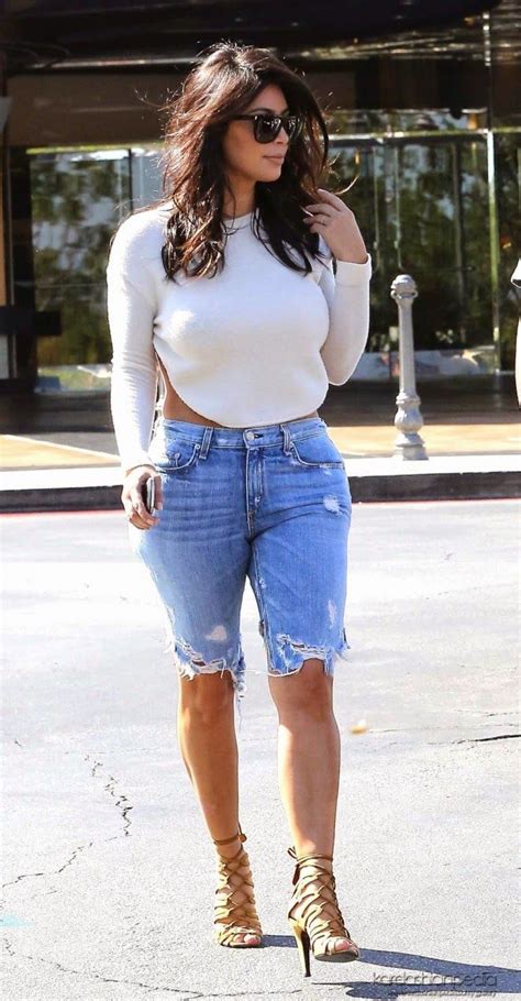 kim kardashian flaunts curves in backless top and denim shorts in calabasas khloe kardashian