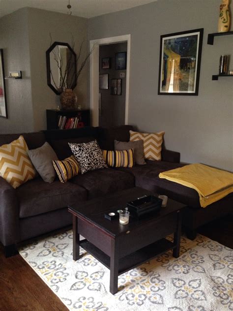 Get 5% in rewards with club o! Grey and yellow living room with dark couch possible ...