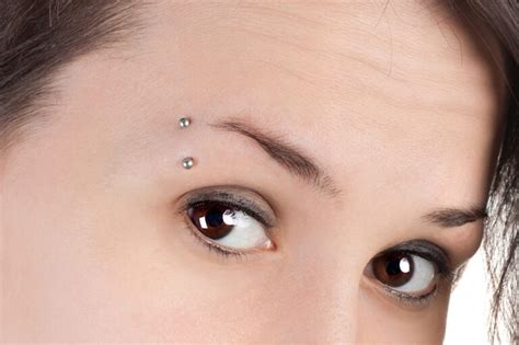 Eyebrow Piercing Your Complete Guide To Getting One Animascorp