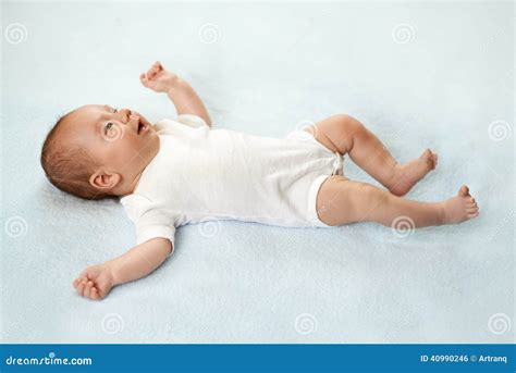 Pretty Baby Is Lying On The Carpet Stock Photo Image Of Newborn Care