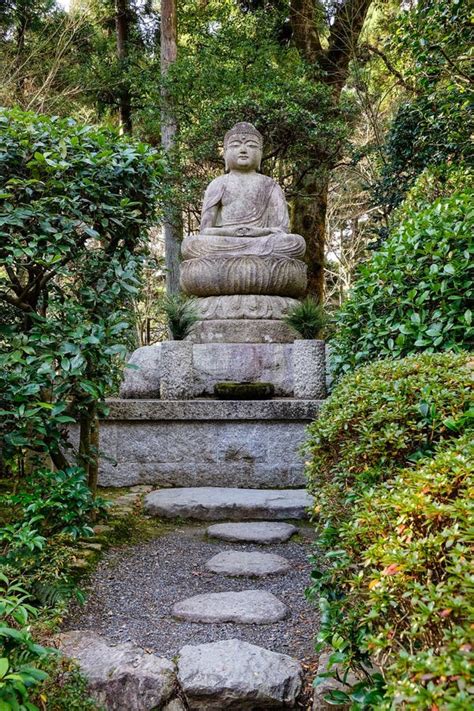 A Buddha Statue At The Japanese Garden In Kyoto Japan Stock Photo