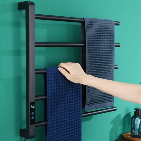 A Person Is Holding Onto A Towel Rack