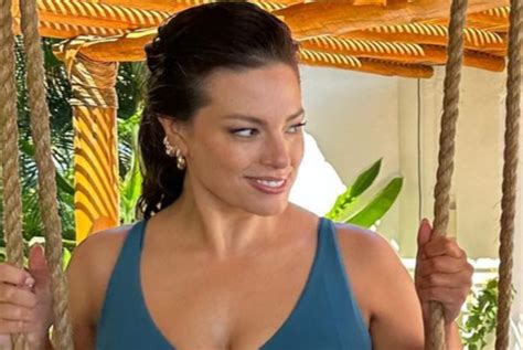 Watch Ashley Graham Show Off All Her Curves In A Colorful Bikinis In