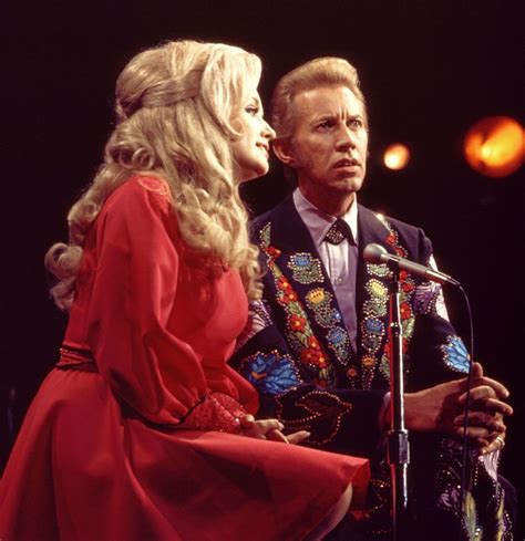 Porter Wagoner Singing With His Great Partner Dolly Parton During The