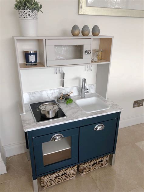 Blush decal set, faux original rattan and glassy cream splashback. Just a Little Tom Howley Kitchen | Ikea play kitchen ...