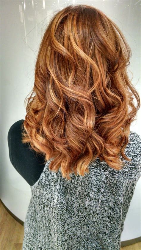 When you first think about red highlights on black hair, the idea might seem a little scary. Amazing copper hair by Sarah Merrill of #Ulta. She did a ...