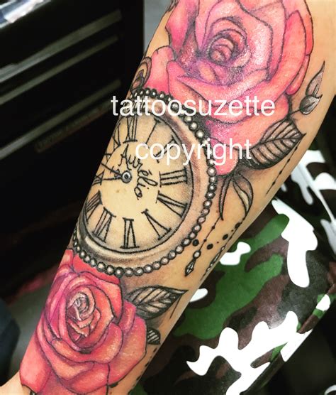 The clock is slanting to the right and is pointing at 2:30. girly arm tattoo roses clock | Girly arm tattoo, Arm ...