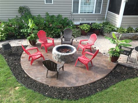 New Stamped concrete Patio with built in fire pit. What a great