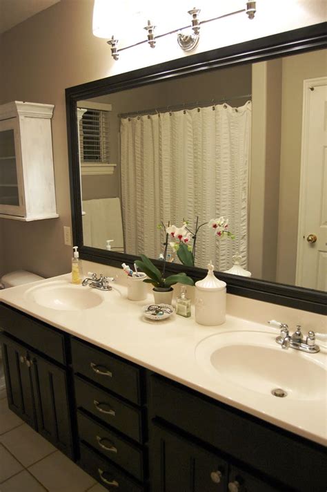 Whether you are framing your bathroom mirror with tile or placing a mirror on a tile way, you can never go wrong if you try out these simple tricks below.you will notice in most bathrooms, mosaic tile. Design Gal & Her Handyman: {bathroom mirror frame}