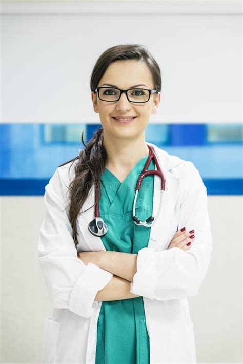 Smiling Beautiful Doctor At Hospital Standing Stock Photo Image Of