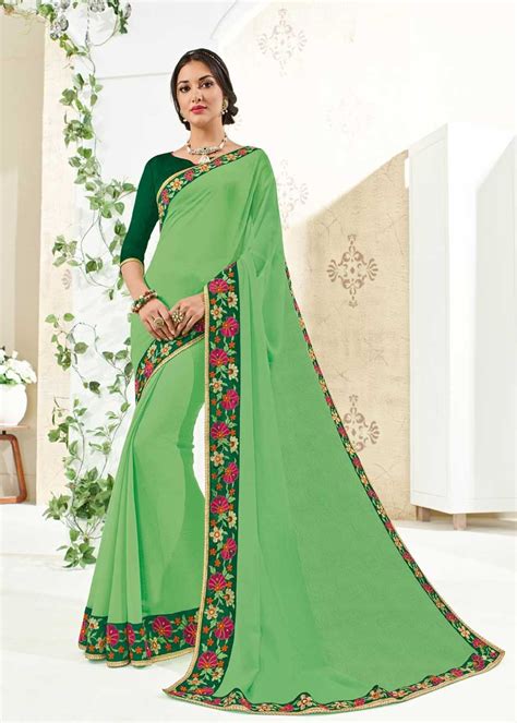 Brighten Up Your Function Adorning This Exclusive Green Color Heavy Embrodered Border Georgette