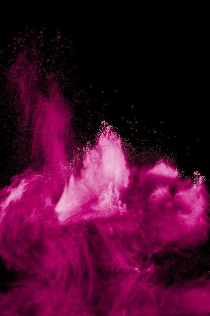Premium Photo Pink Powder Explosion On Black Background